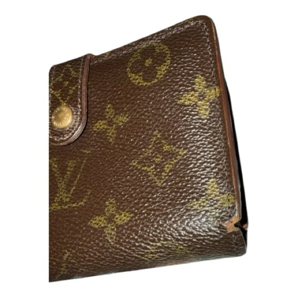 Louis Vuitton Kiss Lock Wallet